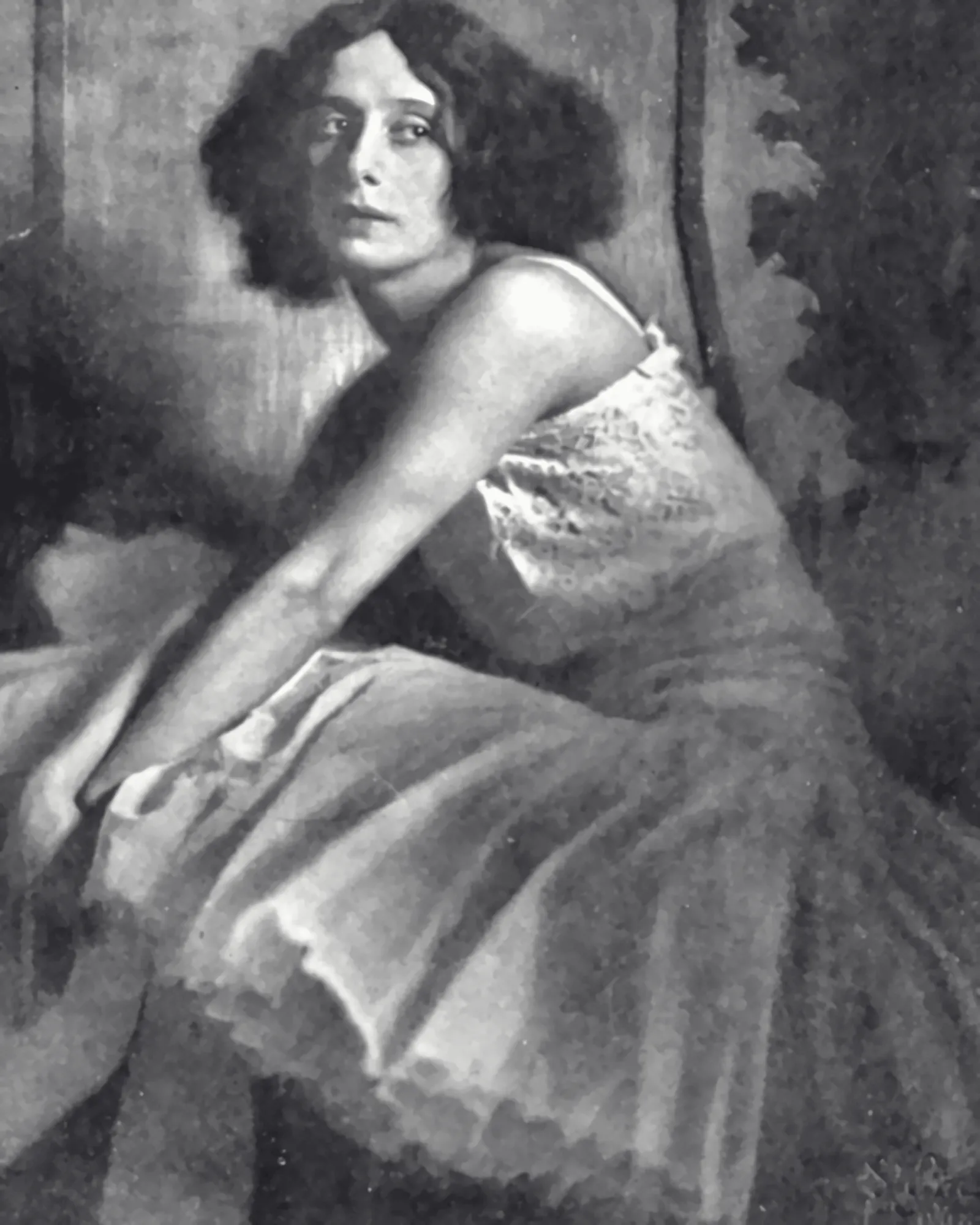 Anna Pavlova seated in a tutu, 1913